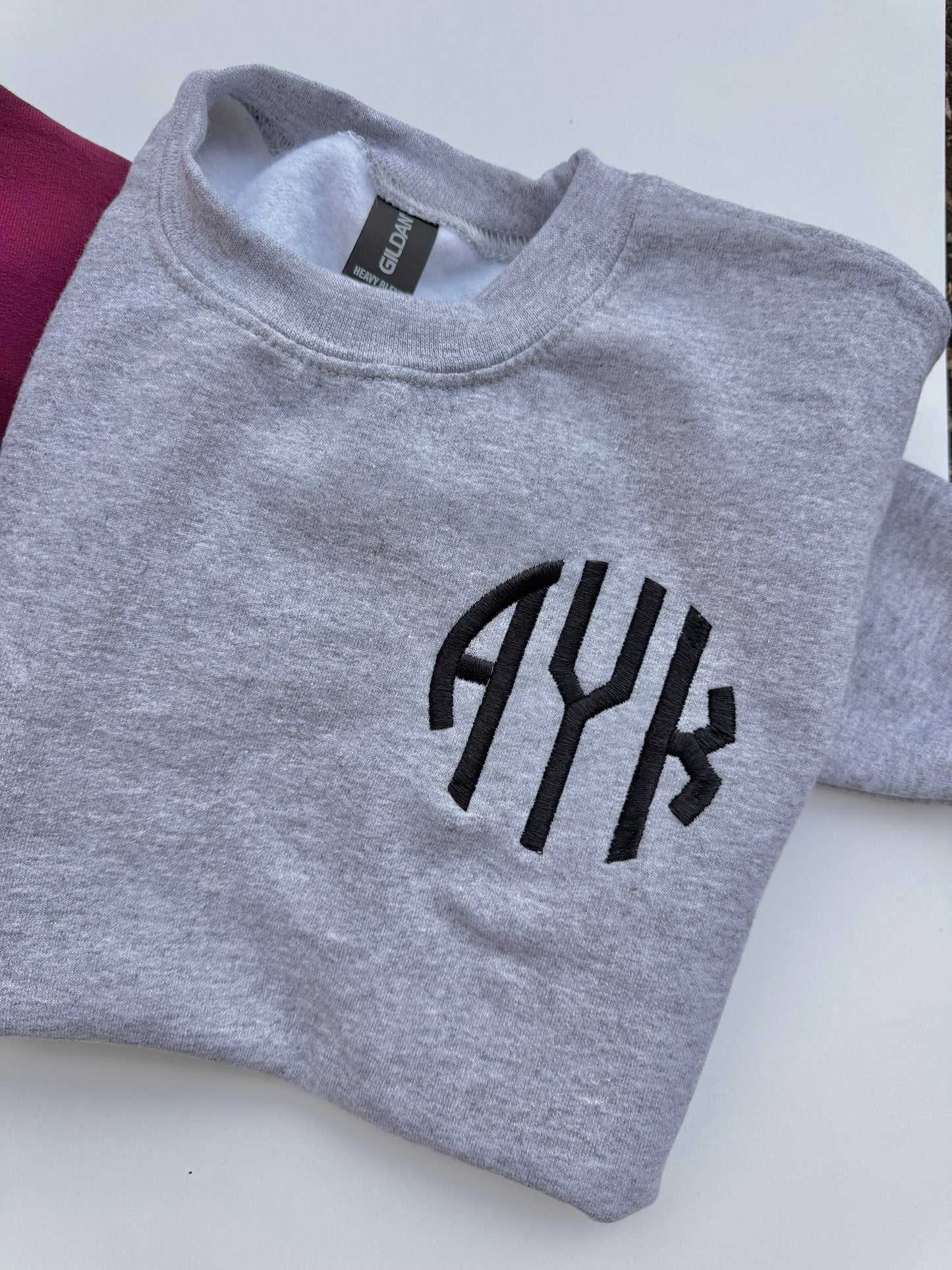MYSTERY MONOGRAM SWEATER